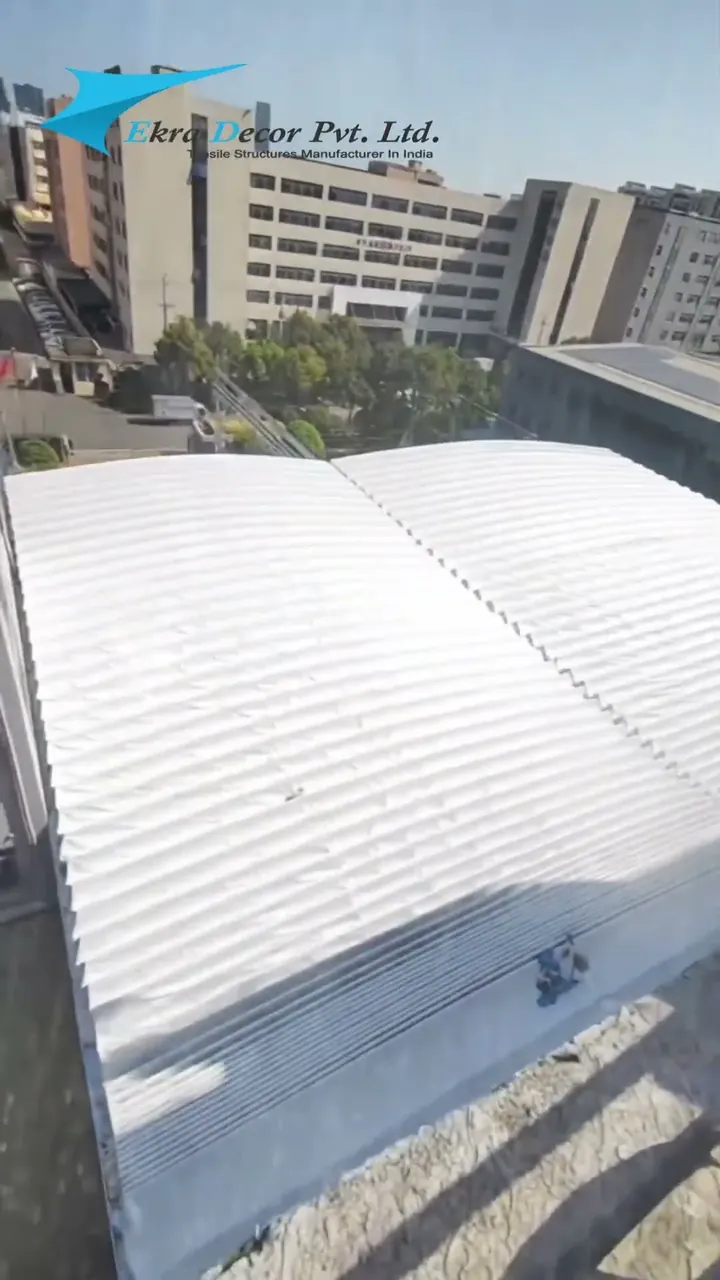 A pleated roof gathering open